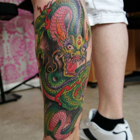 dragon tattoo on leg